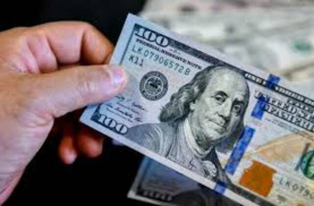 استقرار الدولار مع انحسار توقعات الفائدة الأمريكية