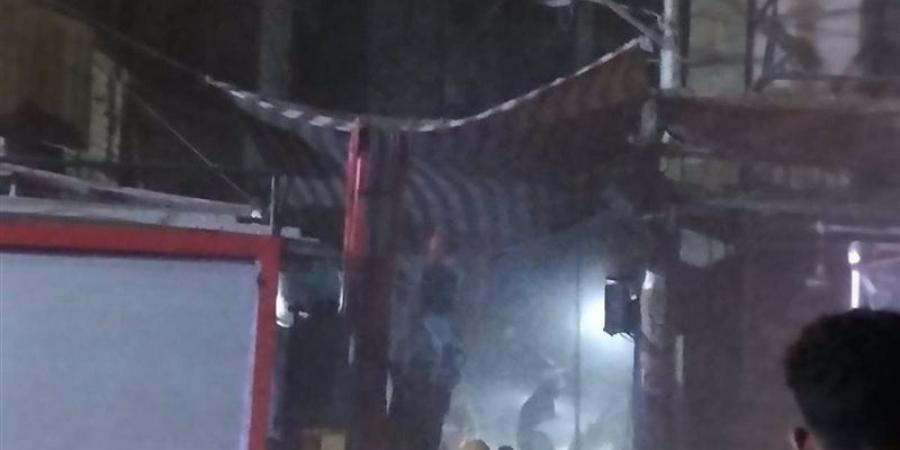 انتشال جثمان سيدة خمسينية من أسفل أنقاض عقار المنيا المنهار